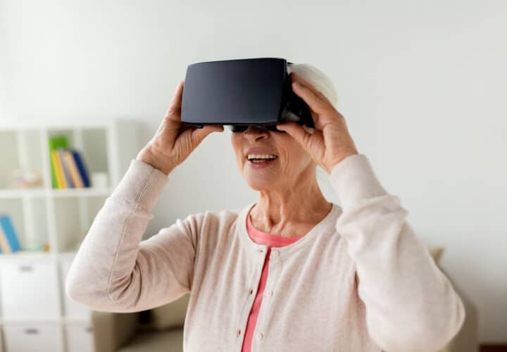 older woman in virtual reality headset