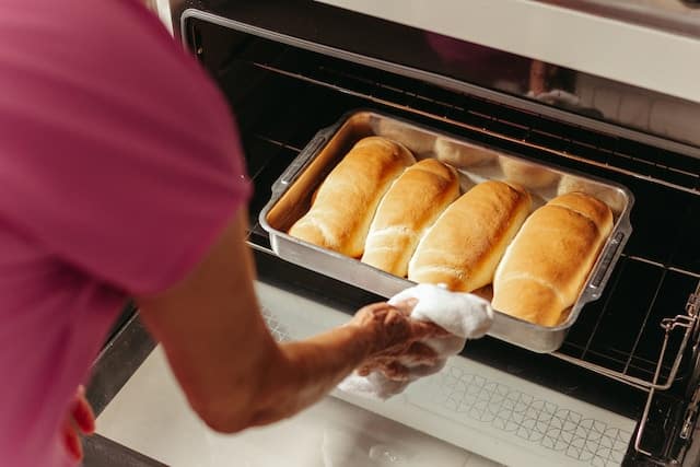 Woman baking bread, cooking, kitchen